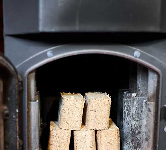 Burning coal and heat logs together